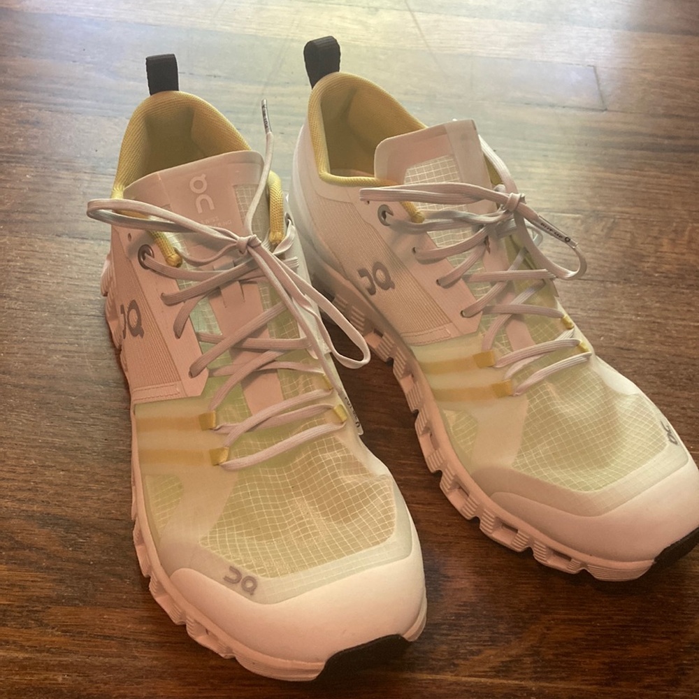 Like new white on running shoes size 9 (worn twice)